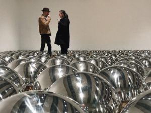 Man and woman talking at Hayward Gallery