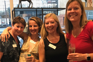 4 women posing for photo at Relational Spaces 2018 summer party