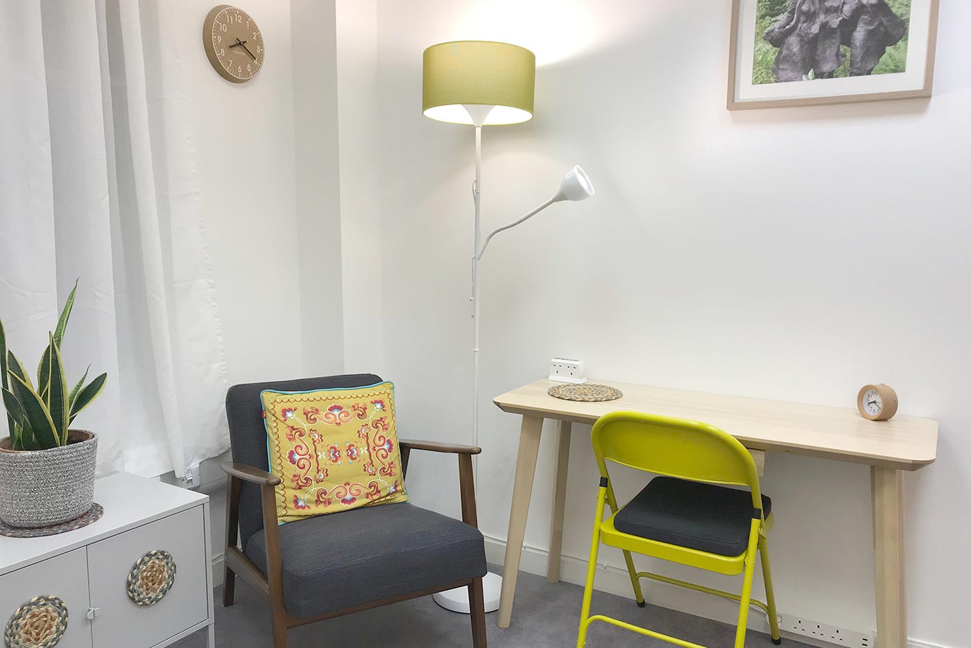 King's Cross Road Room 102: armchair, desk, chair, lamp, picture