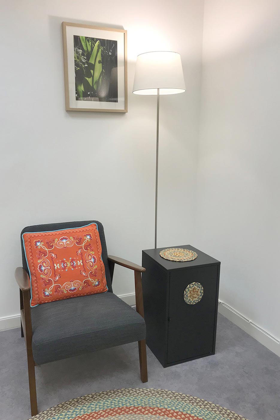 King's Cross Road Room 102: armchair, cabinet, lamp, picture